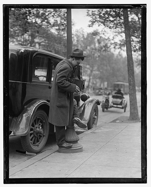 Unidentified photographer with camera, circa 1900. Source: Library of Congress